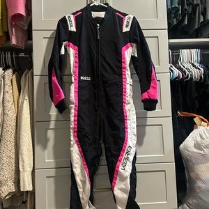 Girls racing suit . Worn a few times . Good condition